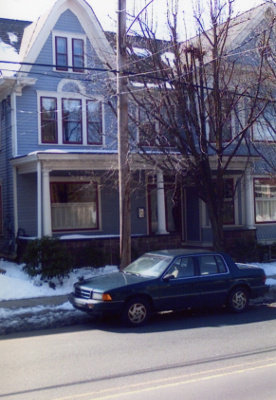 car in front of house